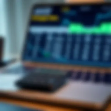 A calculator and laptop displaying mortgage rates and calculations